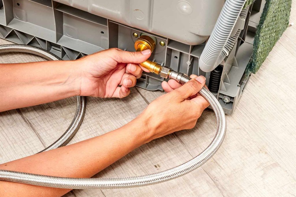 How to install the dishwasher water hose