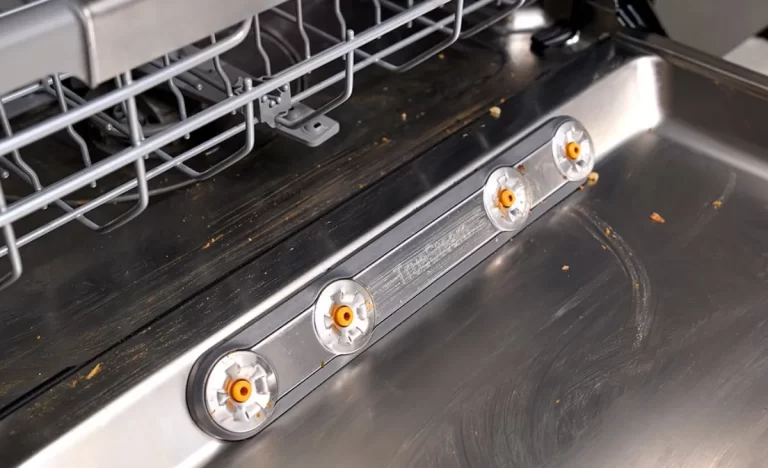 How often should the dishwasher be cleaned